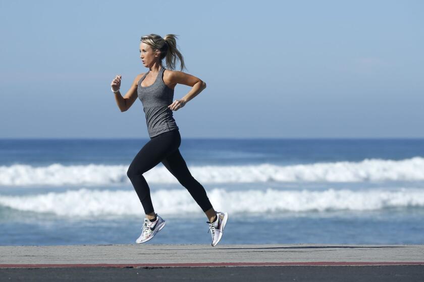 Sheri Matthews Kimmel runs corporate wellness programs for companies across San Diego and is active as a runner, walker and yoga practitioner, while also running Fitbit exercise meetups around the county, shown here Cardiff on Jan. 9, 2019. (Photo by K.C. Alfred/San Diego Union-Tribune)