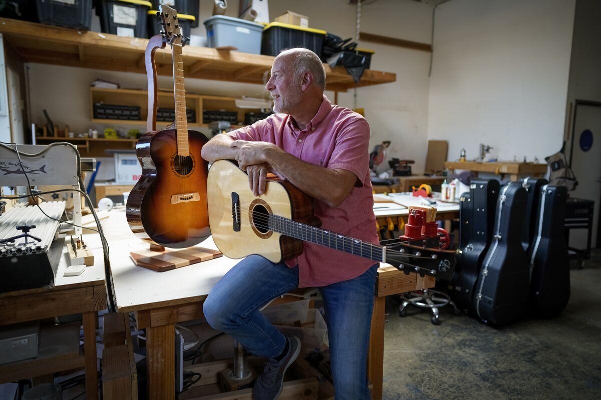 Luthier Shawn Weimar inside his studio at Zoe Guitars in Oceanside.