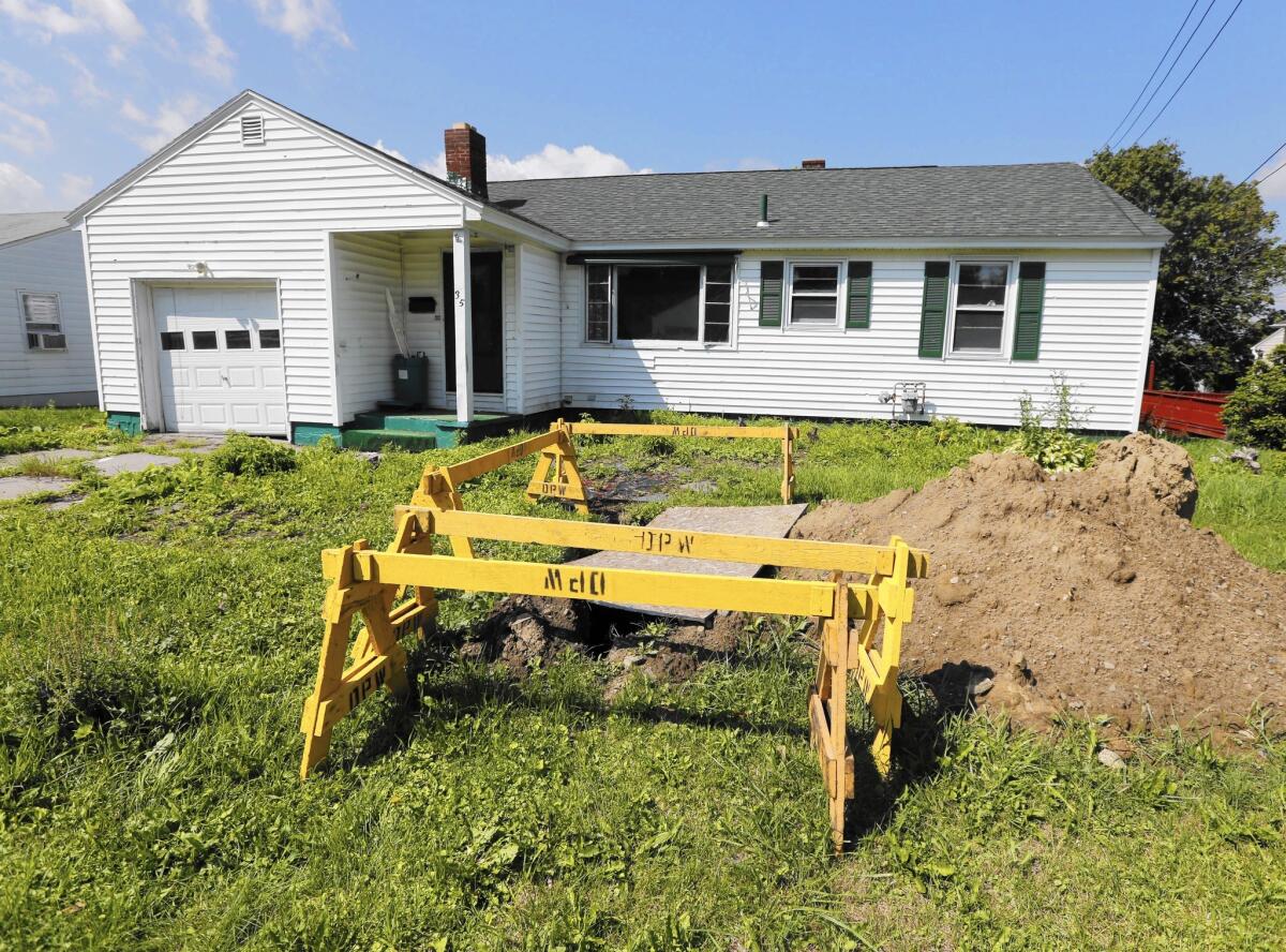 House flippers buy run-down properties, fix them up and resell them quickly at a higher price. Above, a home under renovation in Amsterdam, N.Y.