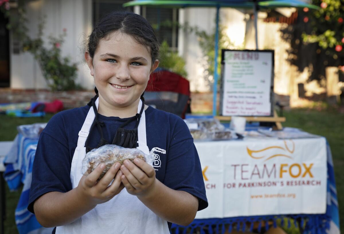 Zoe Bernard of La Mesa, age 9, at her bake sale for Parkinson's disease research on Sept. 5.