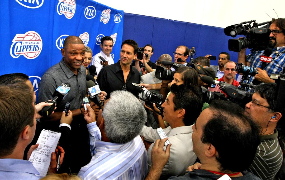 Former Boston Celtics coach Glenn "Doc" Rivers meets members of the press after being introduced the new coach of the Los Angeles Clippers at the Clippers Training facility in Playa Vista.