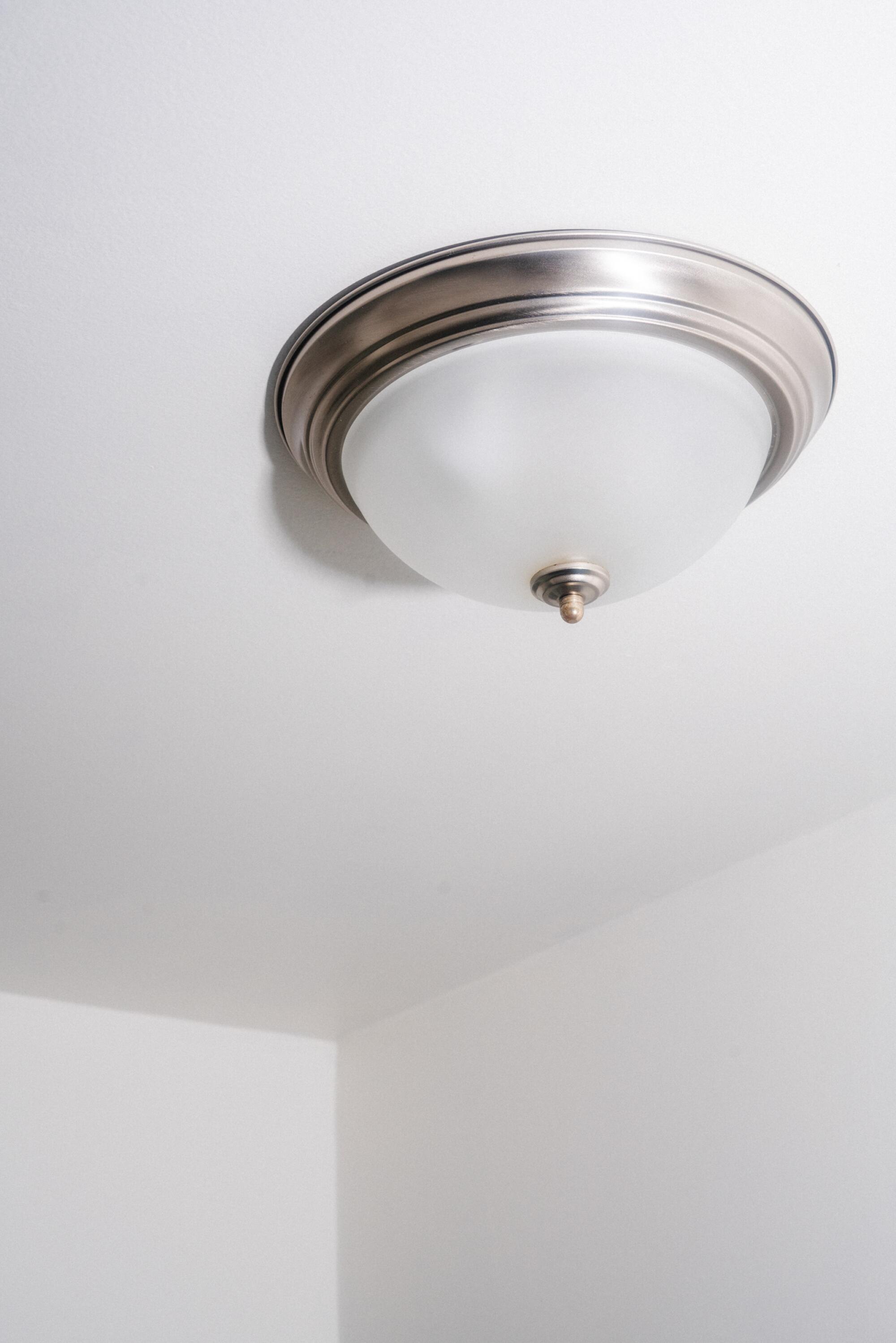 A photo of a white ceiling lamp.