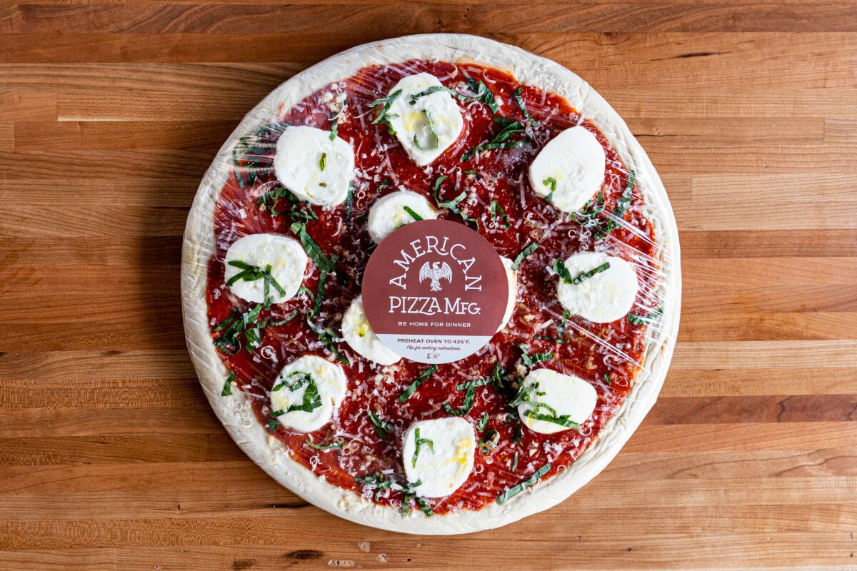 A take-and-bake pizza from newly opened American Pizza Mfg. in La Jolla.