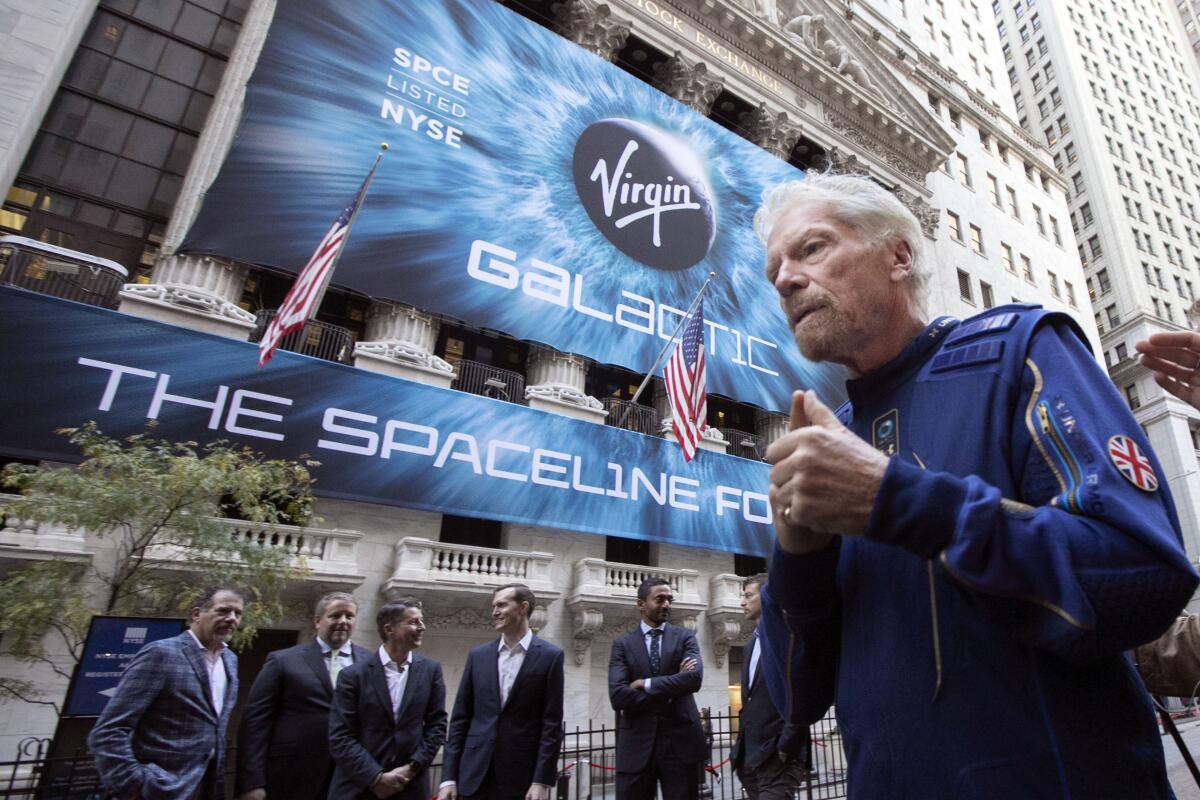 Richard Branson outside the New York Stock Exchange before his company's 2019 IPO. 