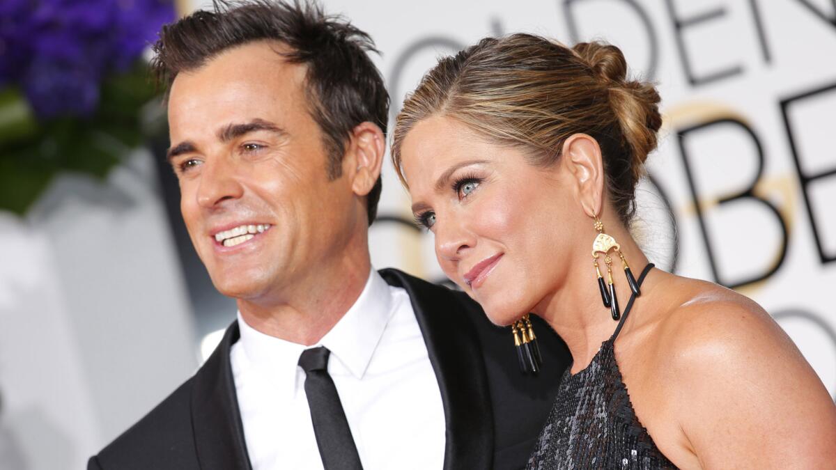 Justin Theroux and Jennifer Aniston are on their honeymoon after getting married in a surprise wedding at their home on Wednesday. They are pictured at the Golden Globes in January.