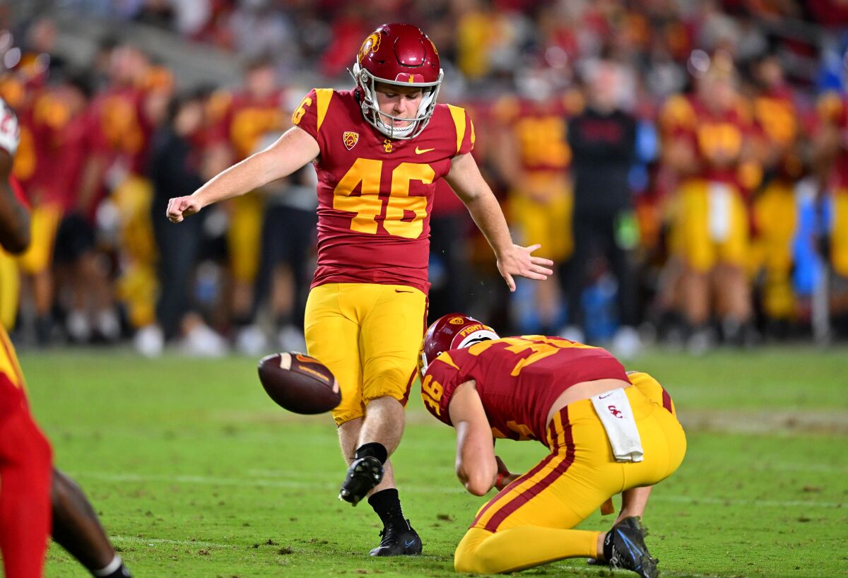 USC kicker Denis Lynch hits a field goal in the game against the Fresno State at the Coliseum on Sept. 17.