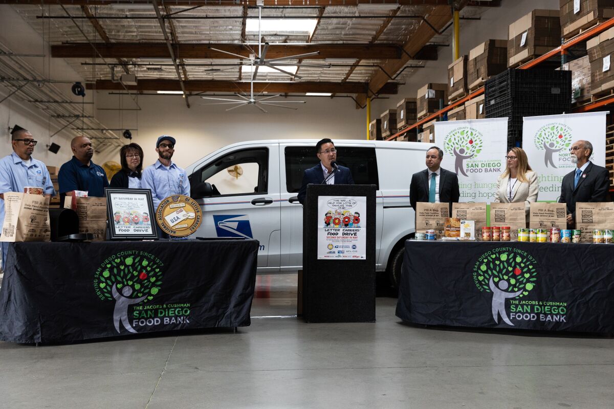 Councilmember Kent Lee speaks about the National Association of Letter Carriers’ “Stamp Out Hunger” food drive