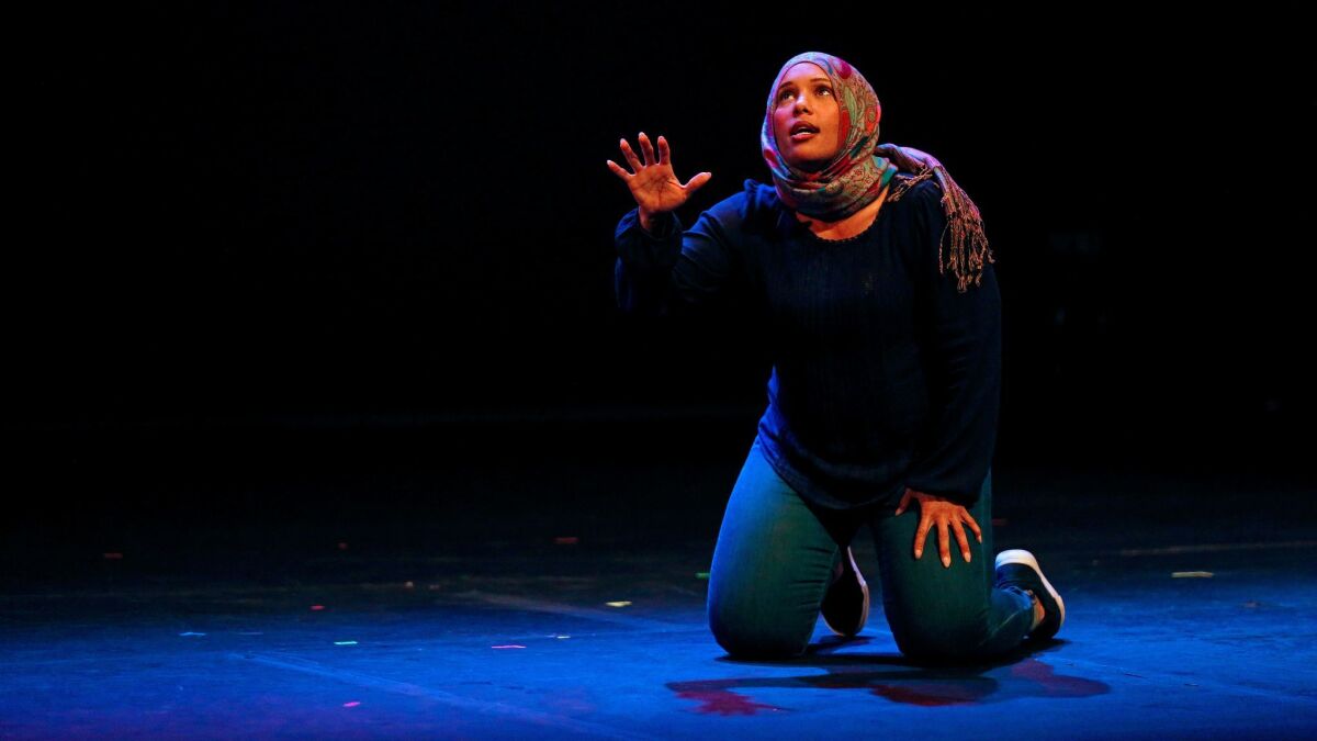 Tamika Katon-Donegal performs one of the acts in "E Pluribus Unum: Out of Many, One," presented by Artists Rise Up Los Angeles at the El Portal Theatre in North Hollywood.