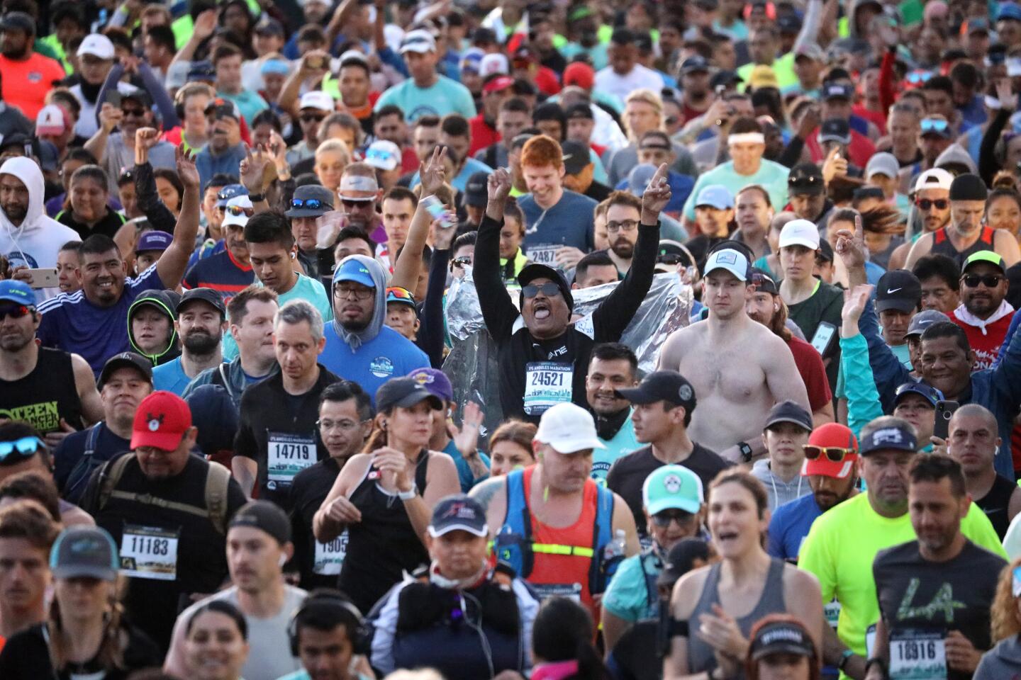 Dodger Stadium was packed with an enthusiastic crowd at the start of the 35th L.A. Marathon.