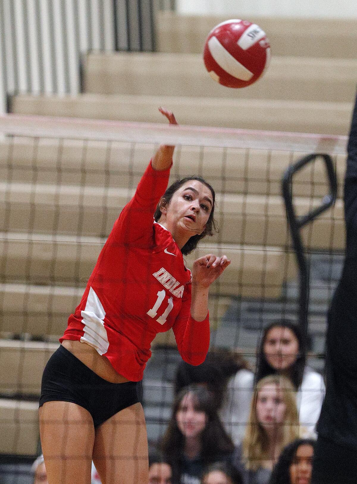 Burroughs' Catie Virtue hits a kill attempt against Murrieta Valley in a CIF Division II playoff girls' volleyball match at Burroughs High School on Thursday, October 24, 2019. Murrieta Valley won the match 3-0.