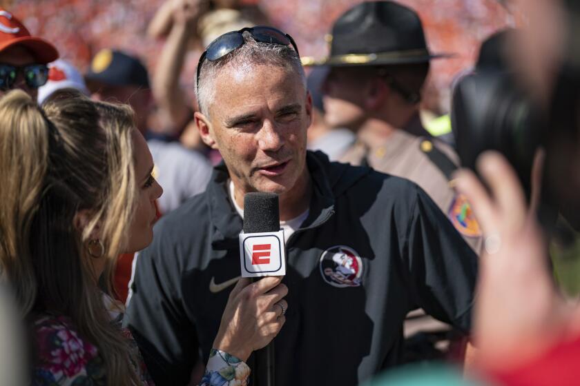 Florida State head coach Mike Norvell gives an interview after defeating Clemson during an NCAA college football game, Saturday, Sept. 23, 2023, in Clemson, S.C. (AP Photo/Jacob Kupferman)