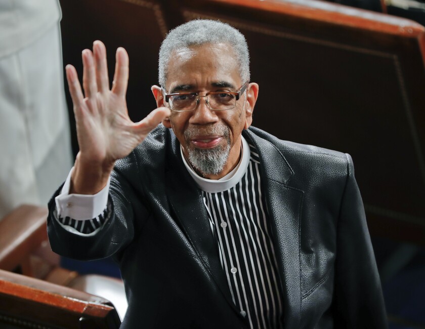 FILE - U.S. Rep. Bobby Rush, D-Ill., waves to guests in the balcony as he takes his seat on Capitol Hill in Washington, Tuesday, Feb. 28, 2017, before President Donald Trump's speech to a joint session of Congress. Longtime U.S. Rep. Rush, a onetime Black Panther with a dramatic rise in Illinois politics, won't seek reelection after 15 terms representing his Chicago-area district, according to a prepared video announcement obtained Monday, Jan. 3, 2022, by The Associated Press. (AP Photo/Pablo Martinez Monsivais, File)