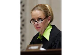 FILE - Wisconsin Supreme Court Justice Annette Ziegler listens to arguments at the Supreme Court in Madison, Wis., on Nov. 11, 2013. The conservative chief justice of the Wisconsin Supreme Court is accusing her liberal colleagues of a "raw exercise of overreaching power" after they flexed their new majority Wednesday, Aug. 2, 2023, and fired the director of the state's court system. On just their second day as a majority on the court after 15 years under conservative control, the four liberal justices voted to fire Randy Koschnick. (M.P. King/Wisconsin State Journal via AP, Pool)