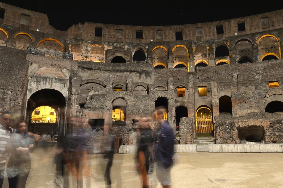 Visitors walk around the Colosseum in Rome. Functioning in groups requires compromise. In exchange for setting aside some of your needs and wants, you get to share novel experiences with your friends.