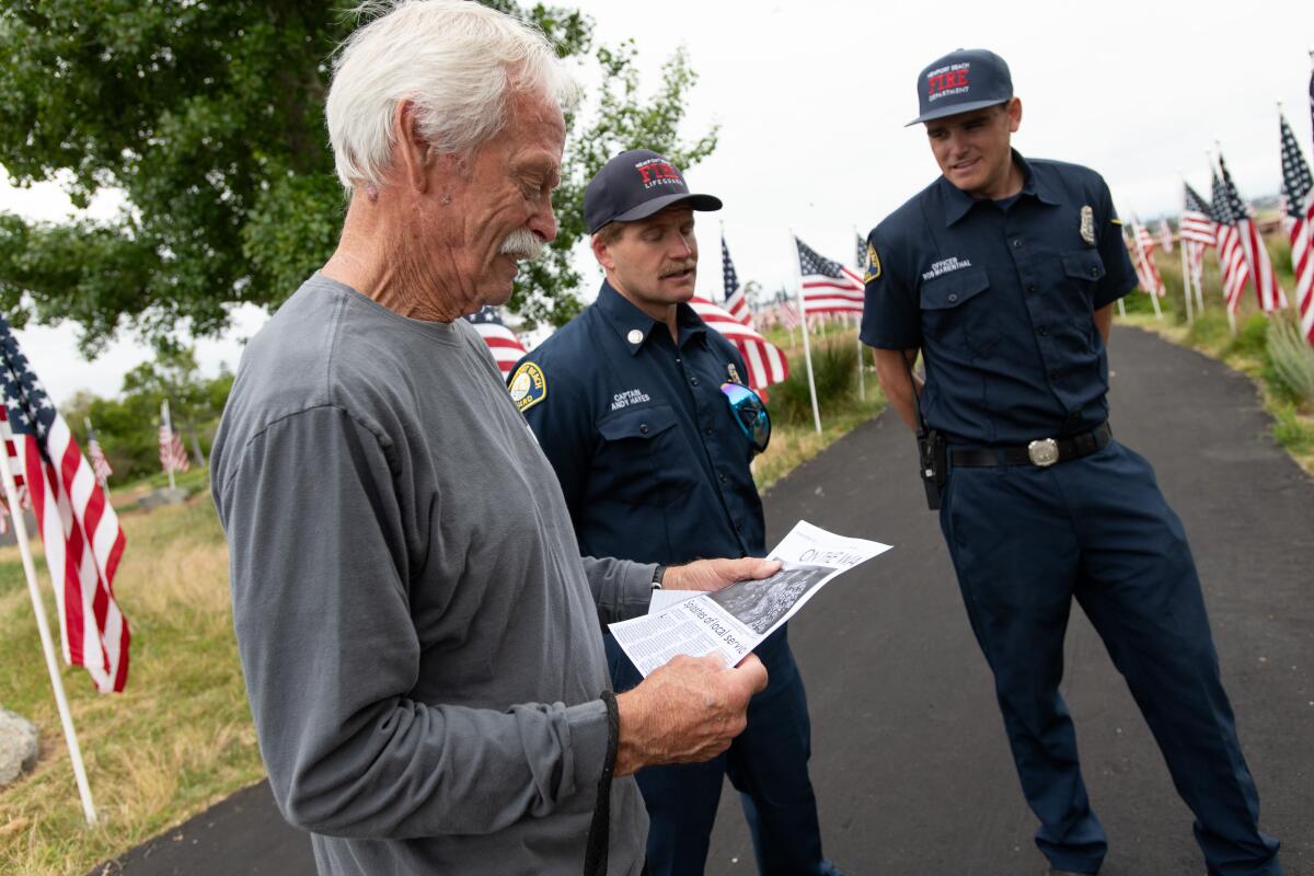 Retired Newport Beach Fire Capt. Jerry Strom, Capt. Andy Hayes and Lifeguard Rob Marienthal.