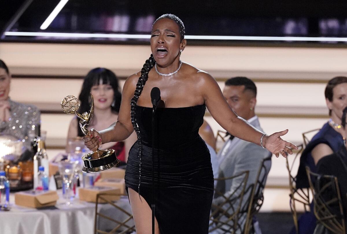 Sheryl Lee Ralph sings as she accepts the Emmy for outstanding supporting actress in a comedy series for "Abbott Elementary" at the 74th Primetime Emmy Awards on Monday, Sept. 12, 2022, at the Microsoft Theater in Los Angeles. (AP Photo/Mark Terrill)