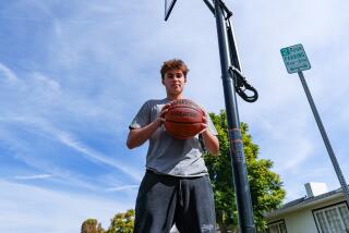 Quincy Watson of Loyola spends hours shooting at a basketball hoop in the street at home.