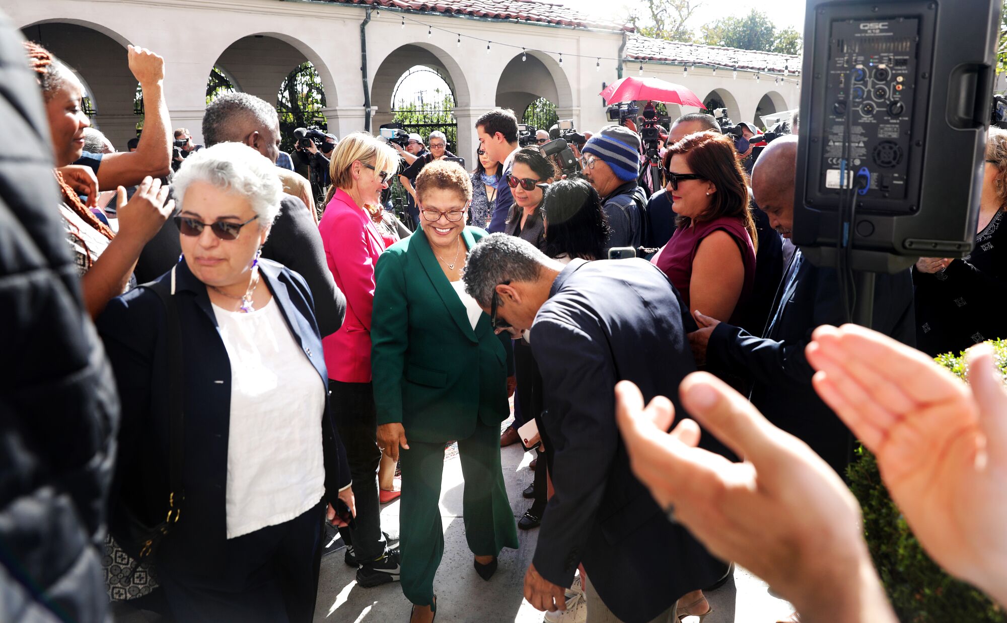 Karen Bass greets supporters at the Wilshire Ebell Theatre in Los Angeles on Thursday.