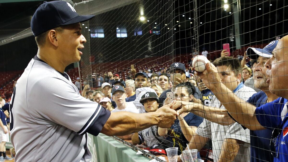 Alex Rodriguez greets fans following the his final game at Fenway Park on Thursday night.