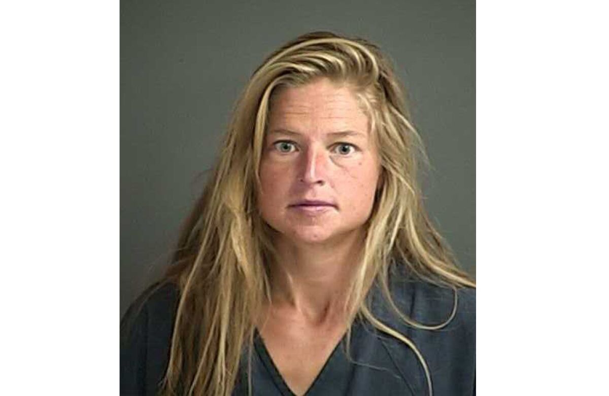 A close-up of a woman charged with arson.