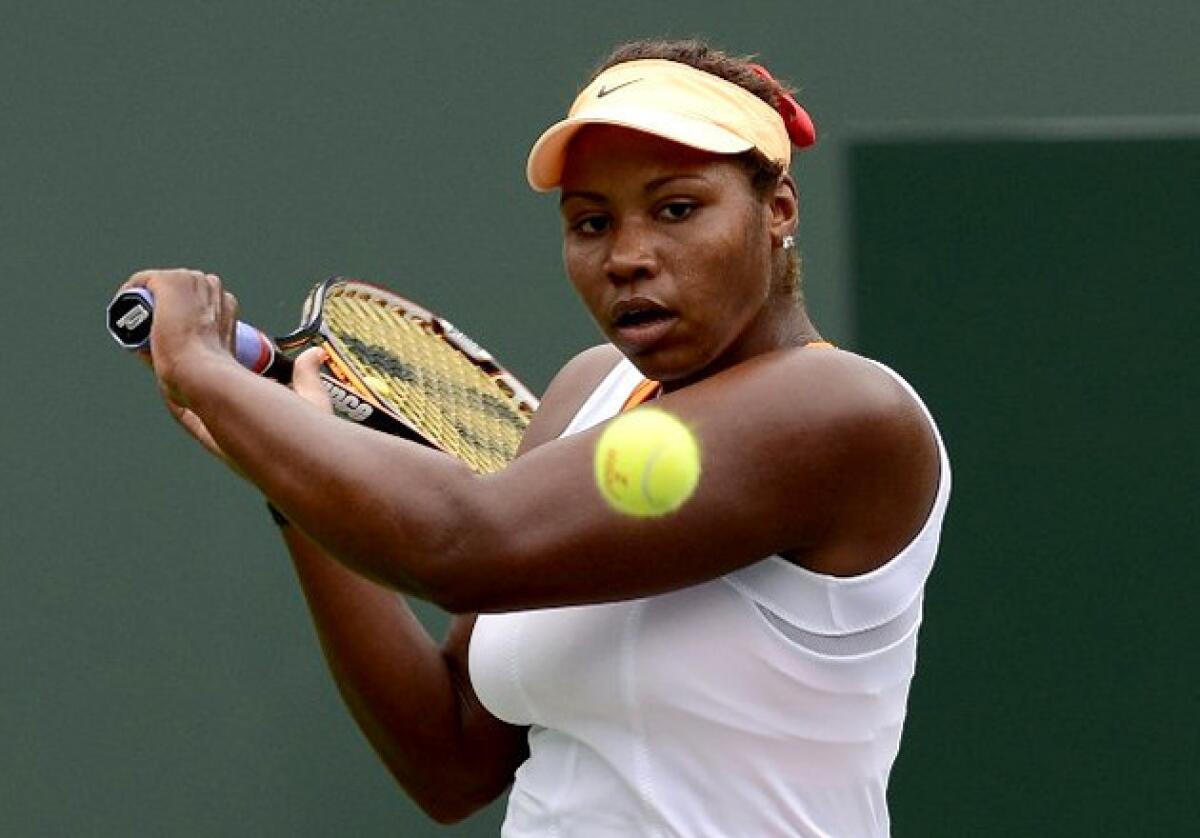 Taylor Townsend eyes the ball for a return against Lucie Hradecka at the BNP Paribas Open tennis tournament in Indian Wells.