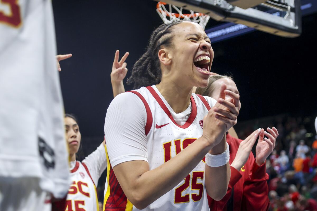 USC guard McKenzie Forbes celebrates after a win over Arizona.