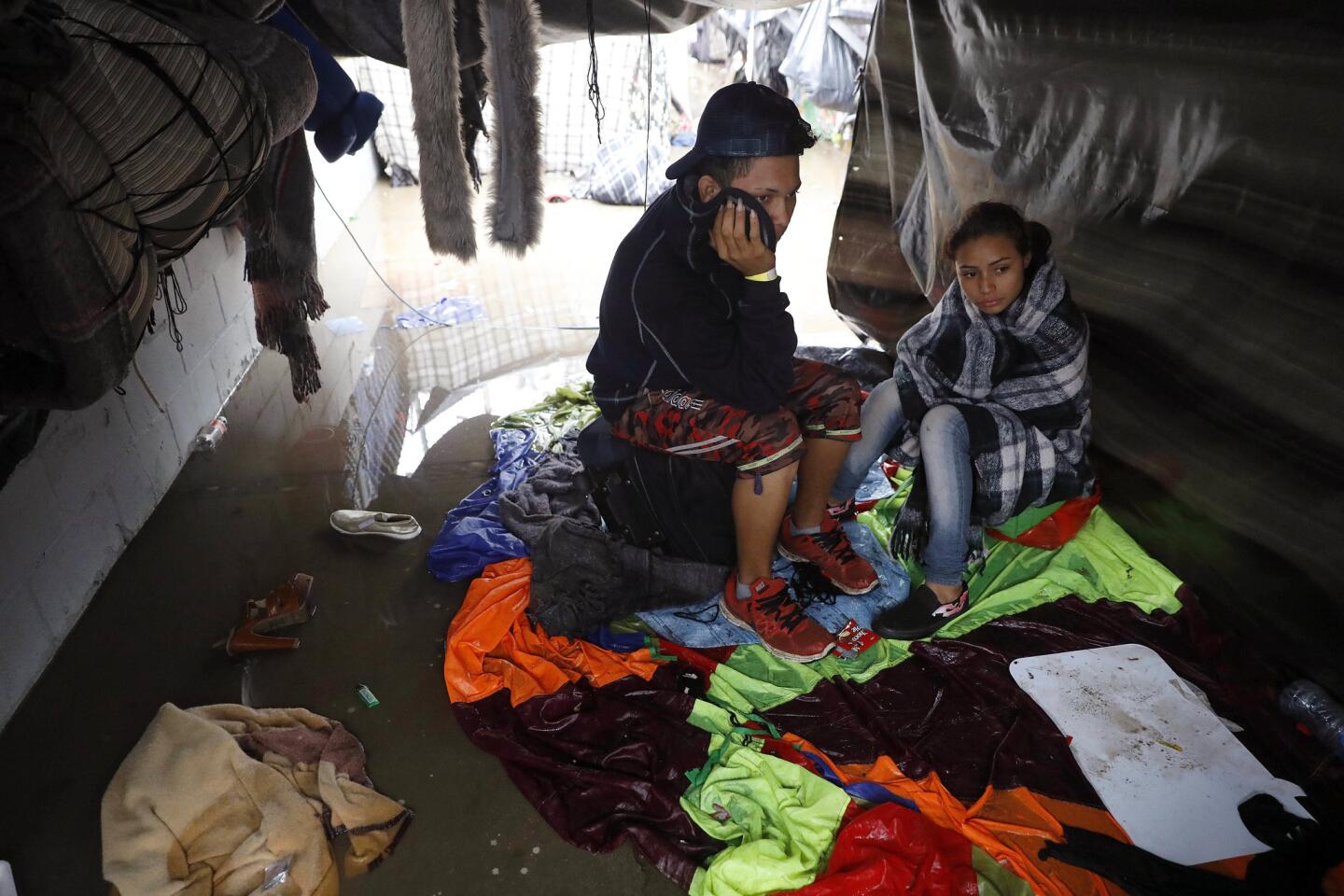 Rain drenches Tijuana migrant camp