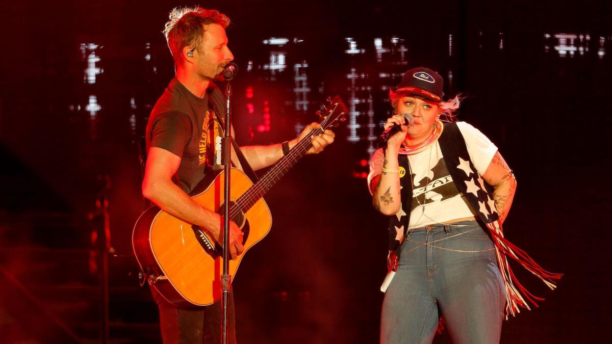 Dierks Bentley performs with Elle King on his hit "Different for Girls" Friday at the Stagecoach country music festival in Indio.