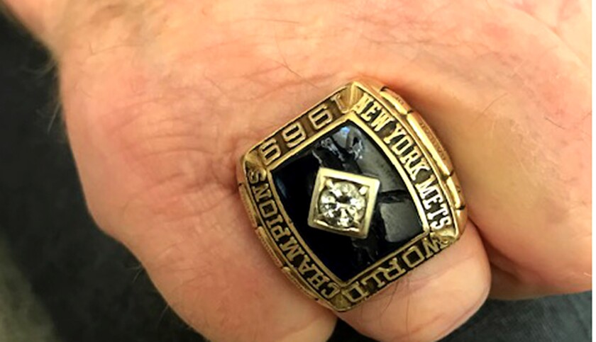 Rod Gaspar displays his 1969 World Series championship ring that he won with the New York Mets.