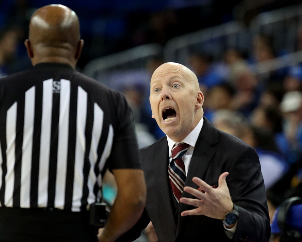 UCLA coach Mick Cronin argues with a referee in the second half of the Bruins' win over Washington.
