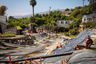 Severe landslide damage on Dauntless Drive near the Portuguese Bend Community on the Rancho Palos Verdes.