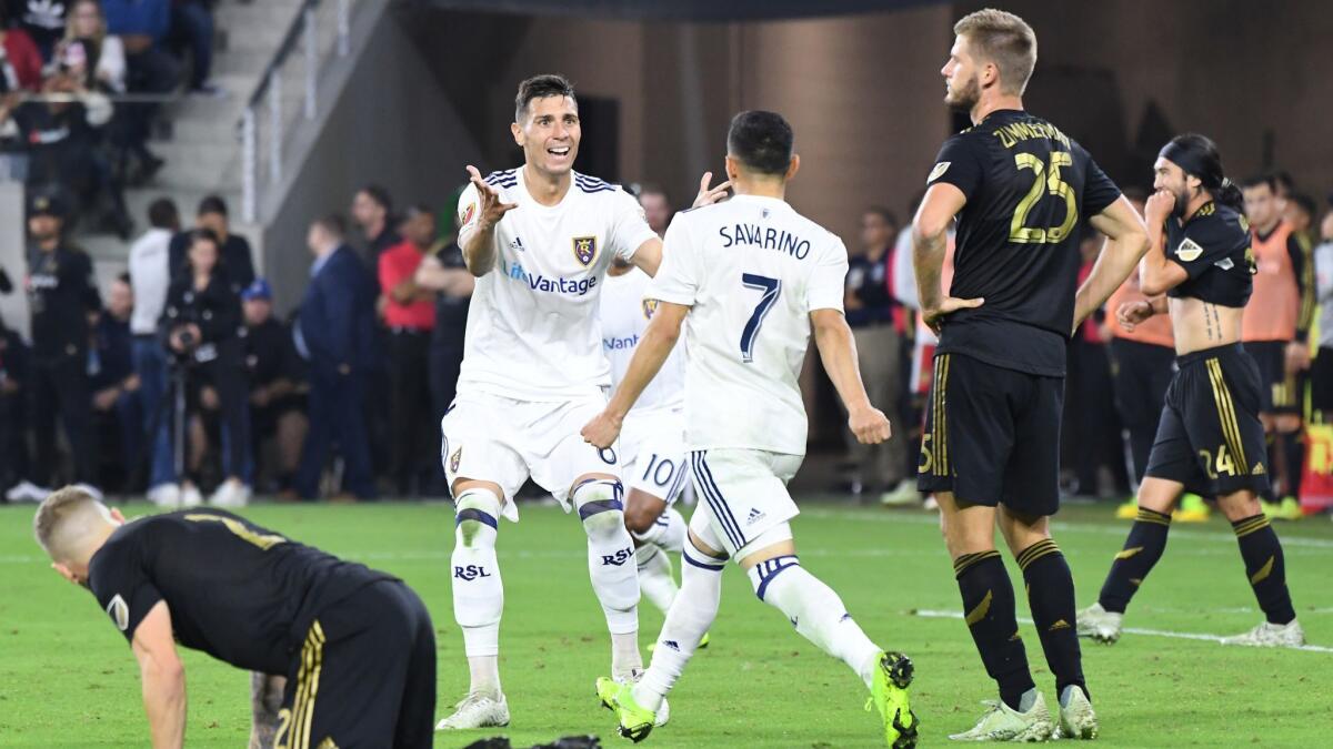 RSL's Jefferson Savarino (7) celebrates his go-ahead goal with Damir Kreilach to make the score 3-2 in the second half.