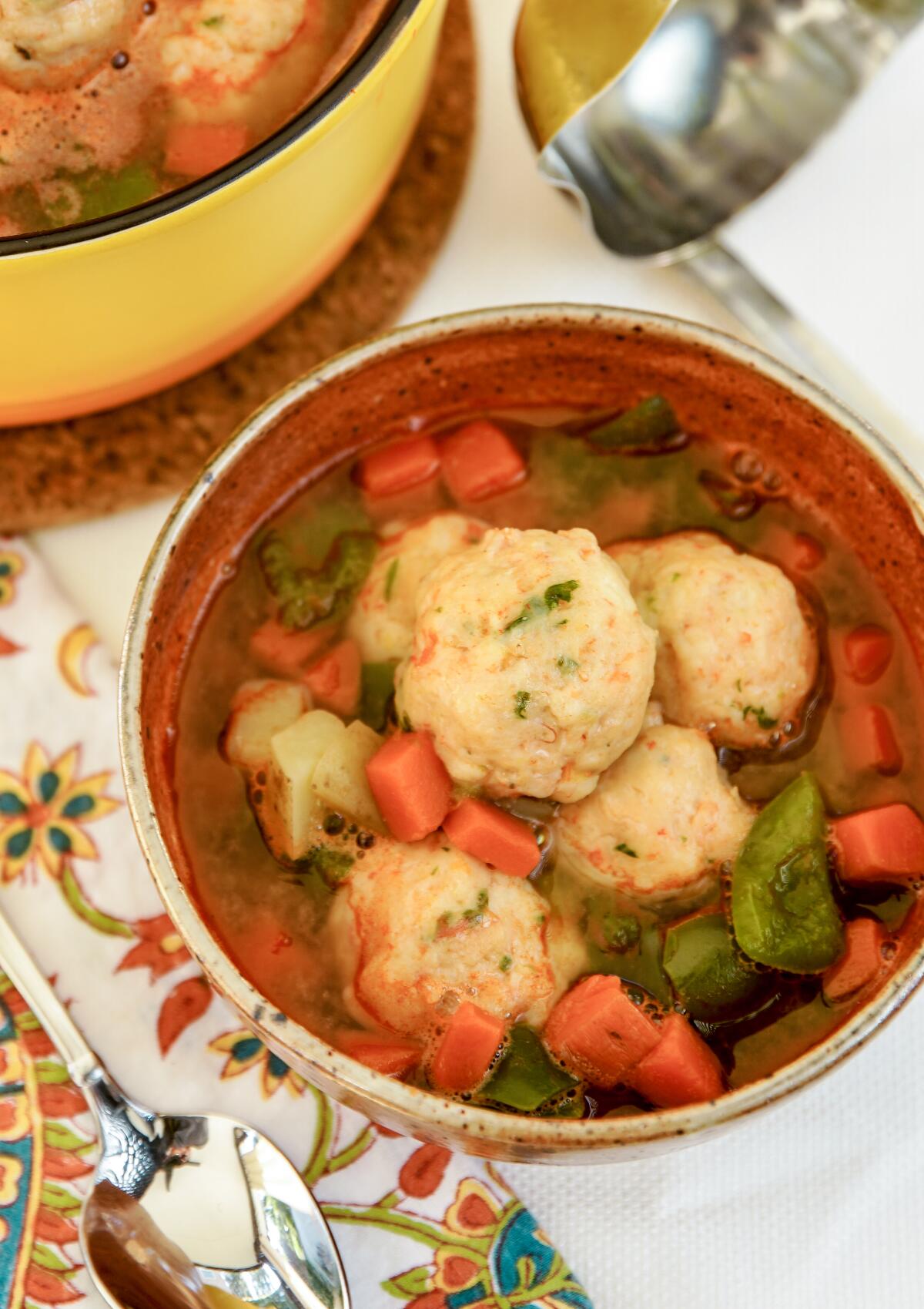 The shrimp balls in this Shrimp Albondigas Soup simmer in a stock made from vegetables and the shrimp heads and shells.
