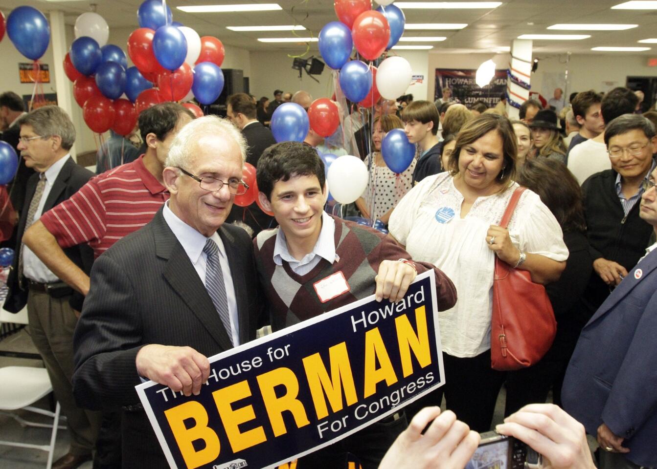 Democratic Congressman Howard Berman has a picture taken with supporter Eytan Wallace during an election night party at his campaign headquarters in Encino.