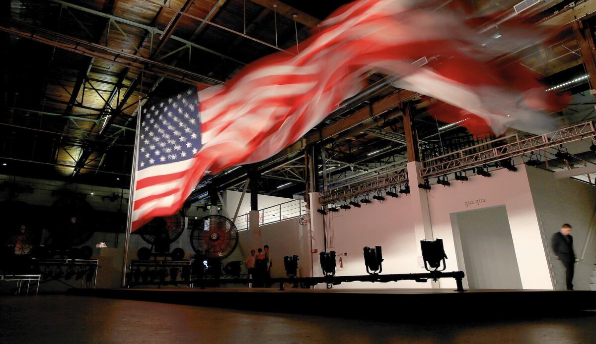 “William Pope.L: Trinket” at Geffen Contemporary was anchored by a monumental — and riveting — 2008 installation sculpture of an enormous American flag whipping in an artificial breeze.
