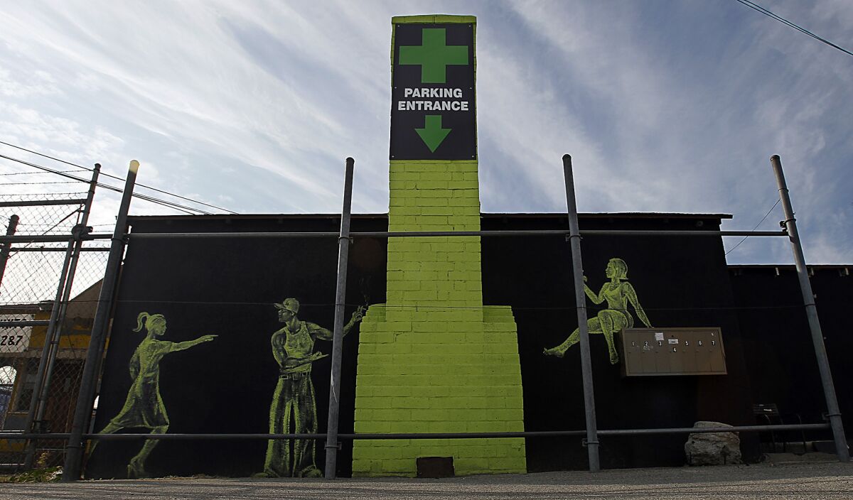 The pot shops that dot the northern half of Lankershim have added their own bit of branding to the landscape, with bold graphics, green signage and those telltale crosses.