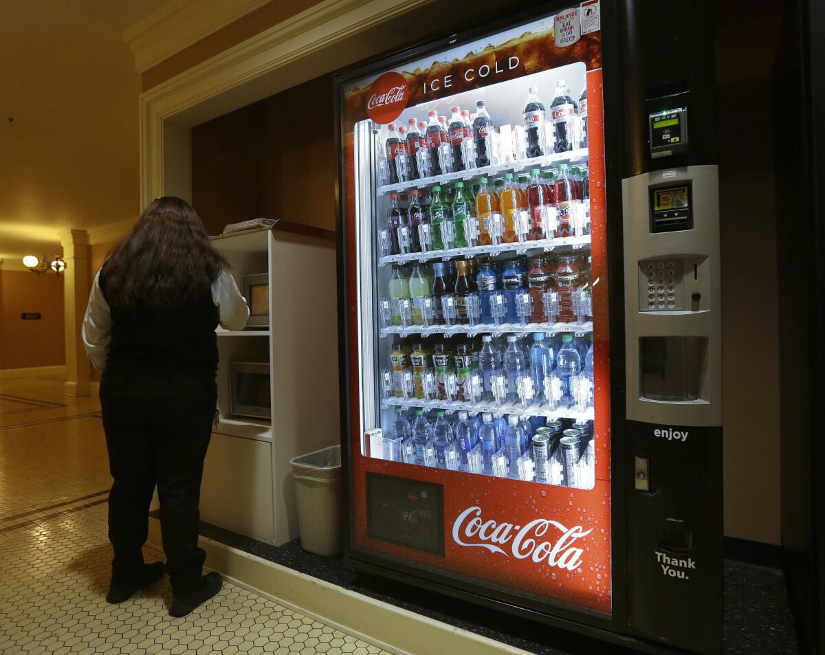 A vending machine in the basement of the California state Capitol in Sacramento. The state Senate has passed a bill requiring health warning labels on sugary drinks. The measure now goes to the Assembly.