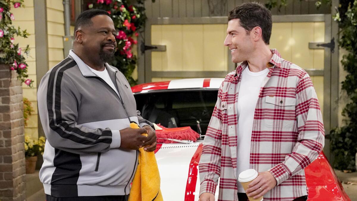 Cedric the Entertainer and Max Greenfield in "The Neighborhood" on CBS.