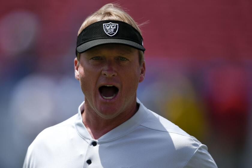 Oakland Raiders' Jon Gruden watches during warm ups before an NFL preseason football game against the Los Angeles Rams Saturday, Aug. 18, 2018, in Los Angeles. (AP Photo/Kelvin Kuo)