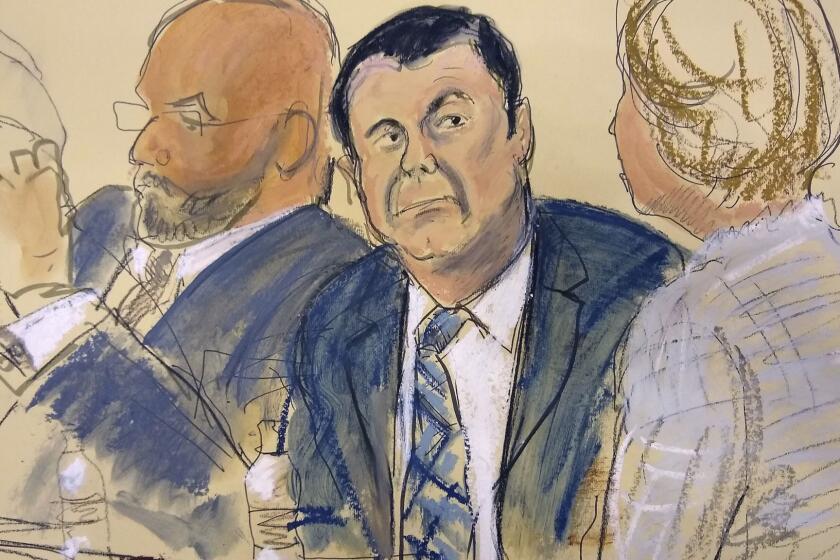 In this courtroom sketch Joaquin "El Chapo" Guzman, center, sits next to his defense attorney Eduardo Balazero, left, for opening statements as Guzman's high-security trial gets underway in the Brooklyn borough of New York, Tuesday, Nov. 13, 2018. Guzman pleaded not guilty to charges that he amassed a multi-billion-dollar fortune smuggling tons of cocaine and other drugs in a vast supply chain that reached New York, New Jersey, Texas and elsewhere north of the border. The infamous Mexican drug lord has been held in solitary confinement since his extradition to the United States early last year. (Elizabeth Williams via AP)