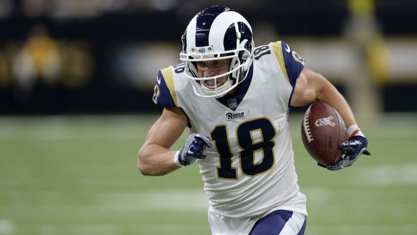 Rams wide receiver Cooper Kupp (18) carries for a touchdown in the second half of last a Nov. 4 game against the Saints.