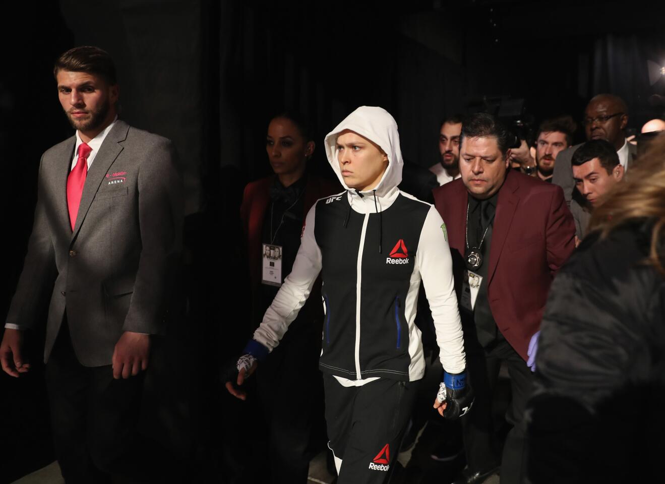 Ronda Rousey walks to the octagon to face Amanda Nunes for the women's bantamweight championship bout at UFC 207.