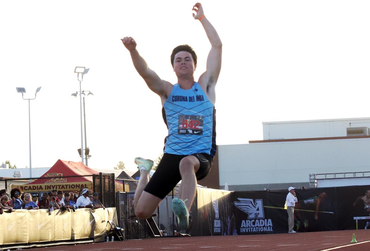 Corona del Mar's Jason Plumb competes in the boys' long jump during the 2022 Arcadia Invitational Track and Field Meet.