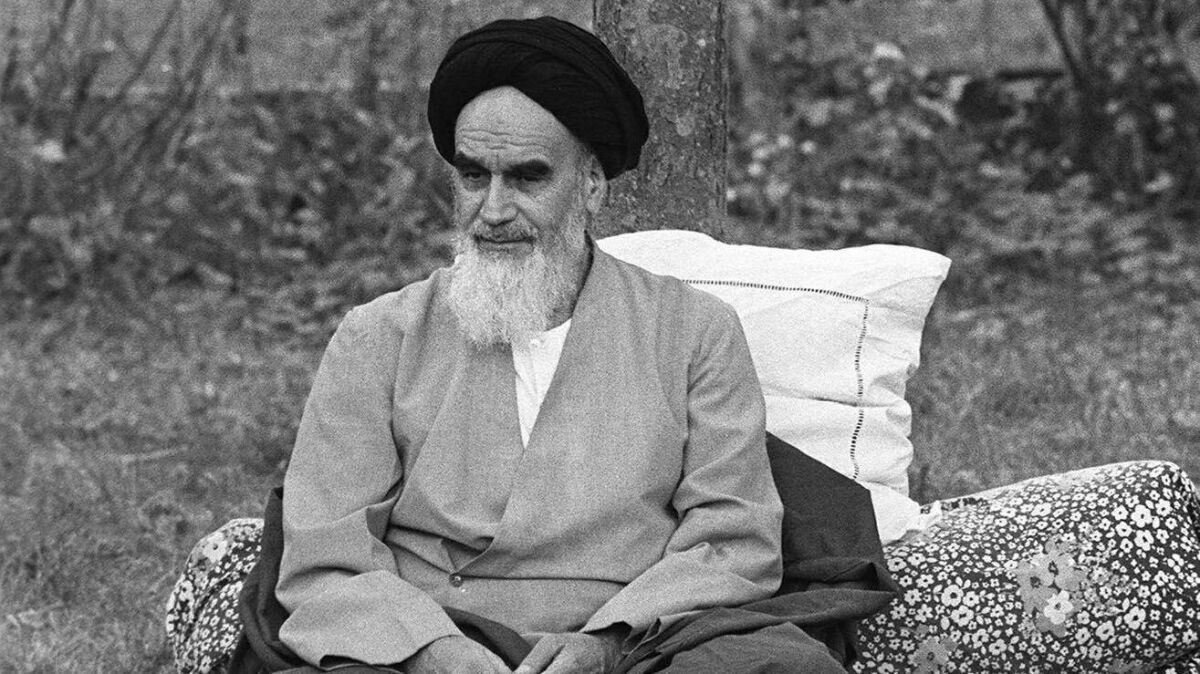 Ayatollah Khomeini sits in his garden Oct. 10, 1978, in Neauphle-Le Chateau, near Paris, a few months before his return to Iran during the Islamic Revolution.