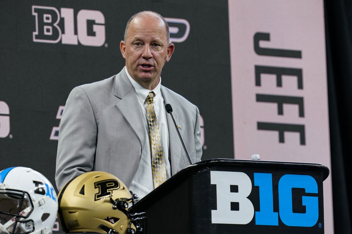 FILE - Purdue head coach Jeff Brohm talks to reporters during an NCAA college football news conference at the Big Ten Conference media days in Indianapolis, in this Friday, July 23, 2021, file photo. Brohm named Jack Plummer the starting quarterback late last week, partially because of his mobility. But Brohm also made it clear he's still willing to make a change -- if he doesn't get the kind of play he expects. (AP Photo/Michael Conroy, File)