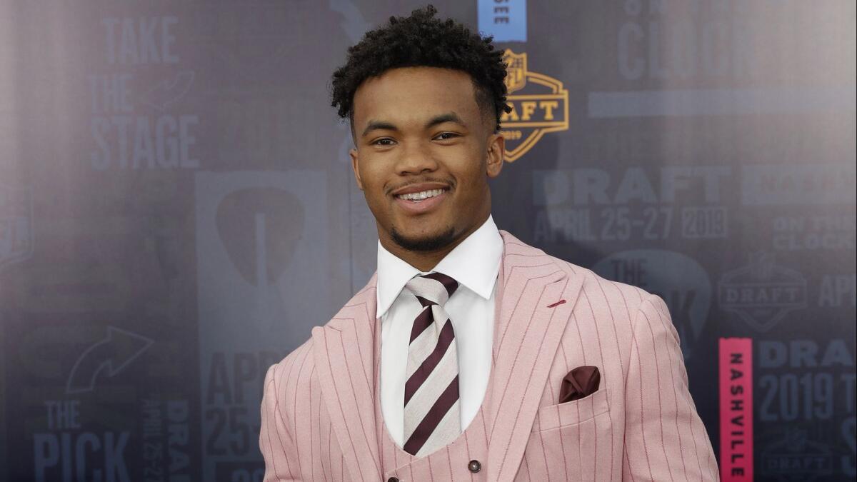 Oklahoma quarterback Kyler Murray walks the red carpet ahead of the first round at the NFL football draft.