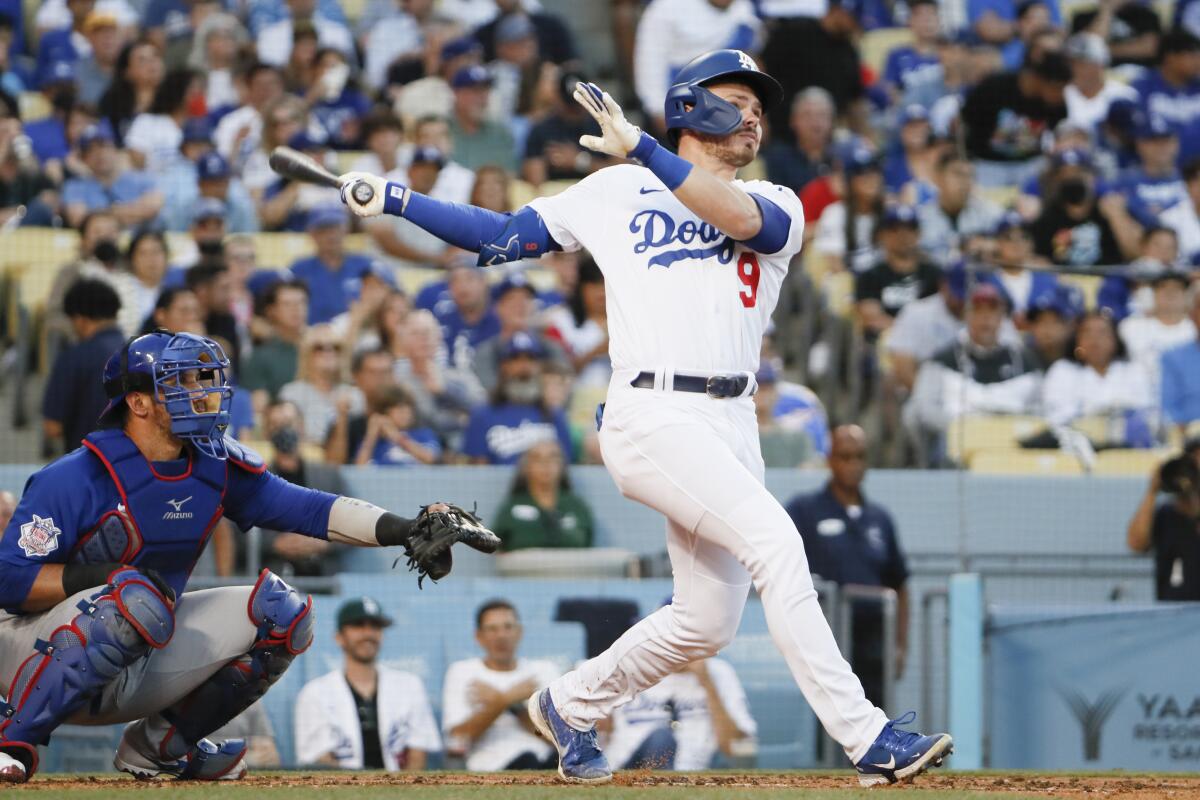 Dodgers' Gavin Lux watches his two-run home run against the Chicago Cubs.