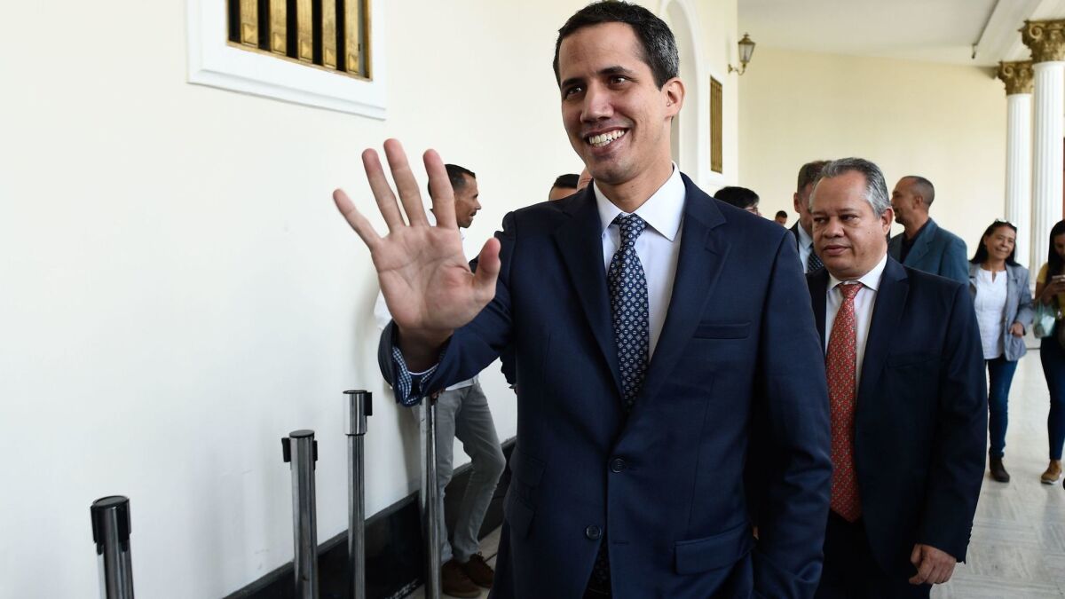 The president of Venezuela's opposition-led National Assembly, Juan Guaido Marquez, arrives for a session at the Federal Legislative Palace in Caracas on Jan. 22, 2019.