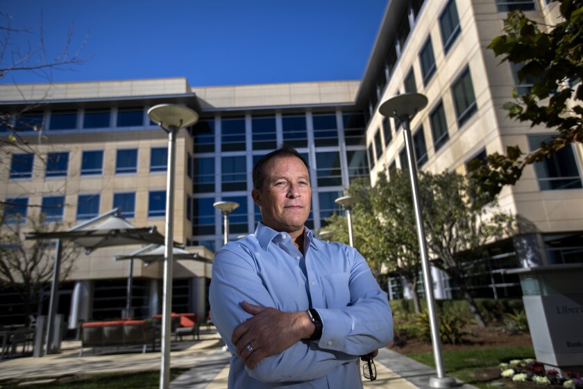 David Cristofaro, chief executive of Actionable Research Inc., stands outside his Aliso Viejo market research firm.