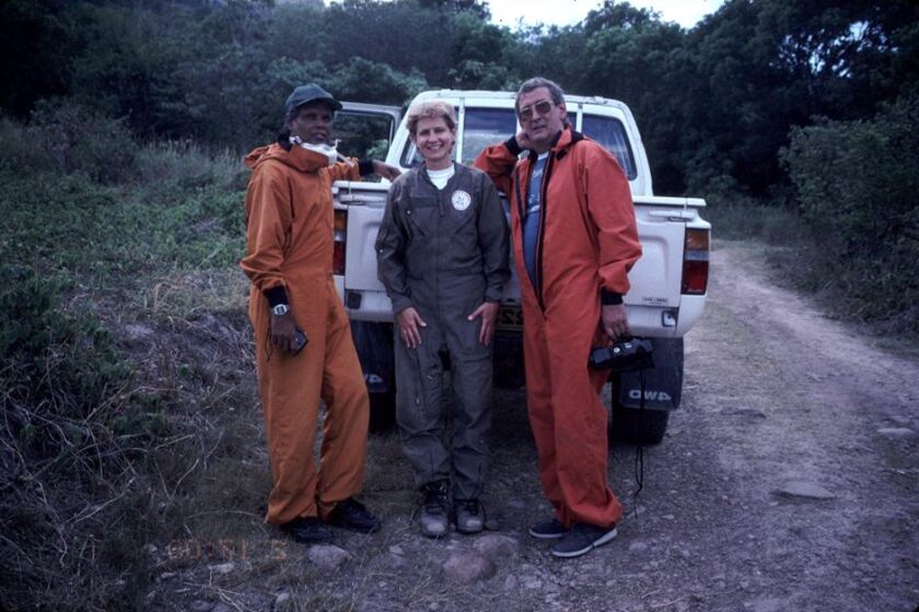 Margaret Mangan, center, visited the island of Monserrat during the 1997 eruption of the Soufriere Hills volcano as part of the US Geological Survey's Volcanic Disaster Assistance Program. Mangan is the longtime scientist-in-charge of the USGS California Volcano Observatory.